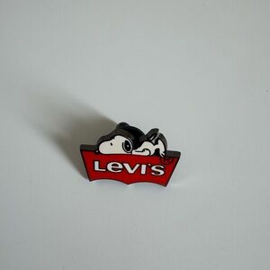 Levi's brand pin featuring Snoopy.